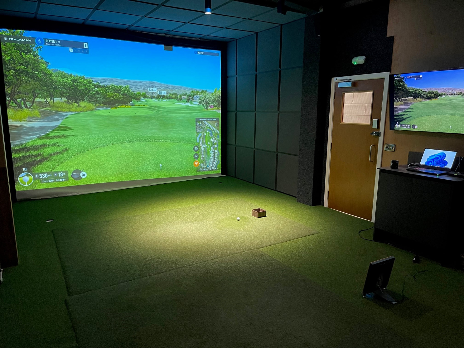 Trackman simulator studio at Noah's Ark Golf Centre with a virtual course on the big screen